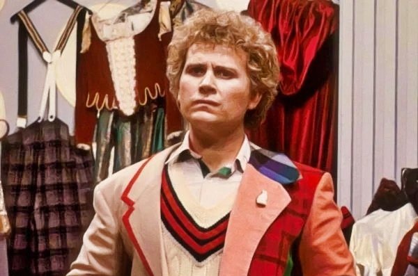 Colin Baker in mid costume change