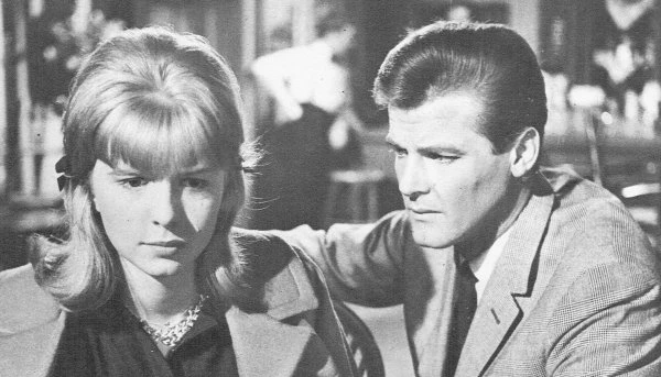 Roger Moore as The Saint